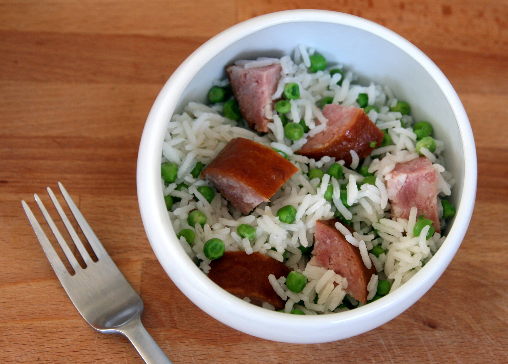 Basmati à la saucisse de Morteau et aux petits pois