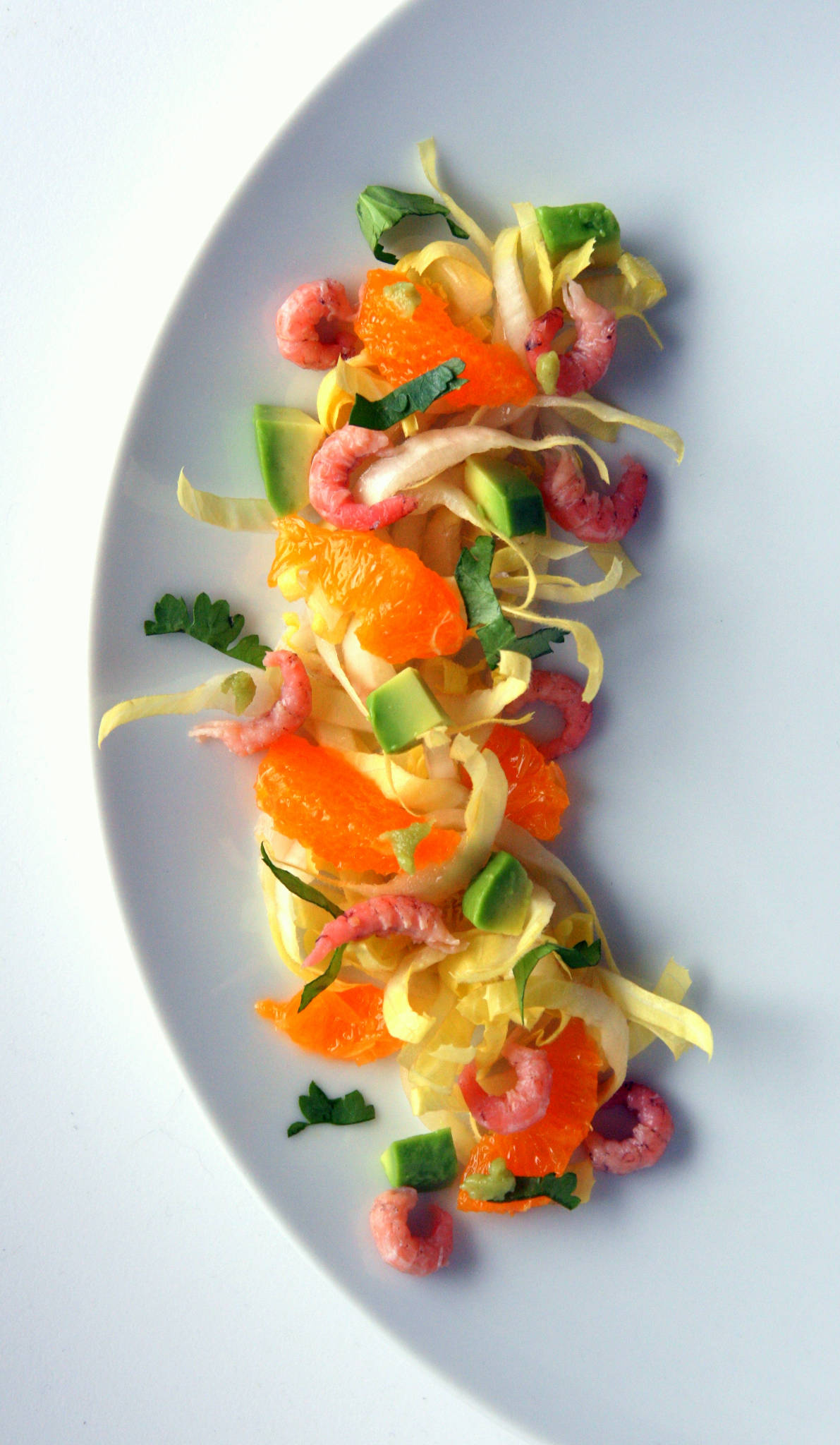 Salade d'endives aux crevettes grises, avocat, mandarine & wasabi