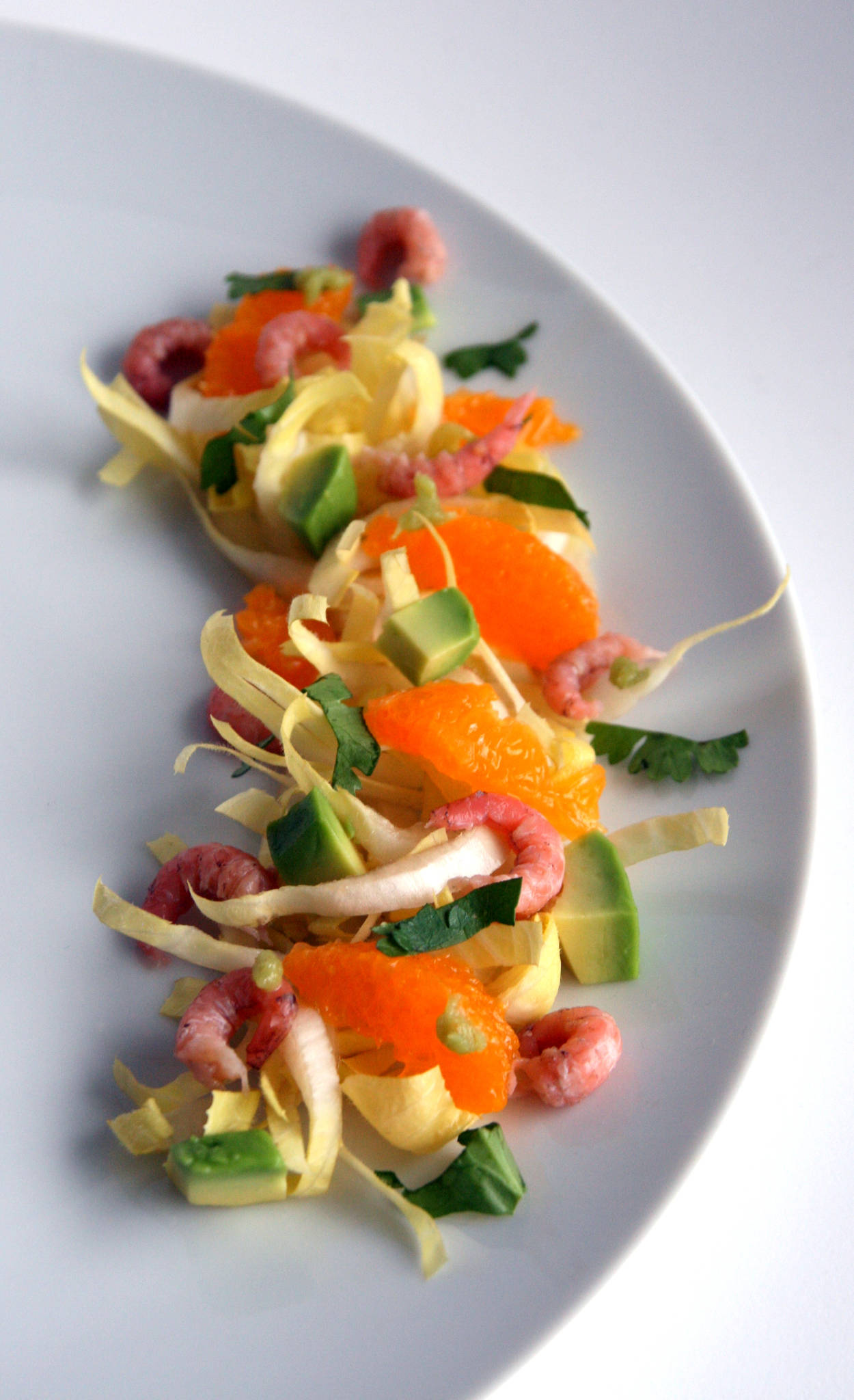 Salade d'endives aux crevettes grises, avocat, mandarine & wasabi