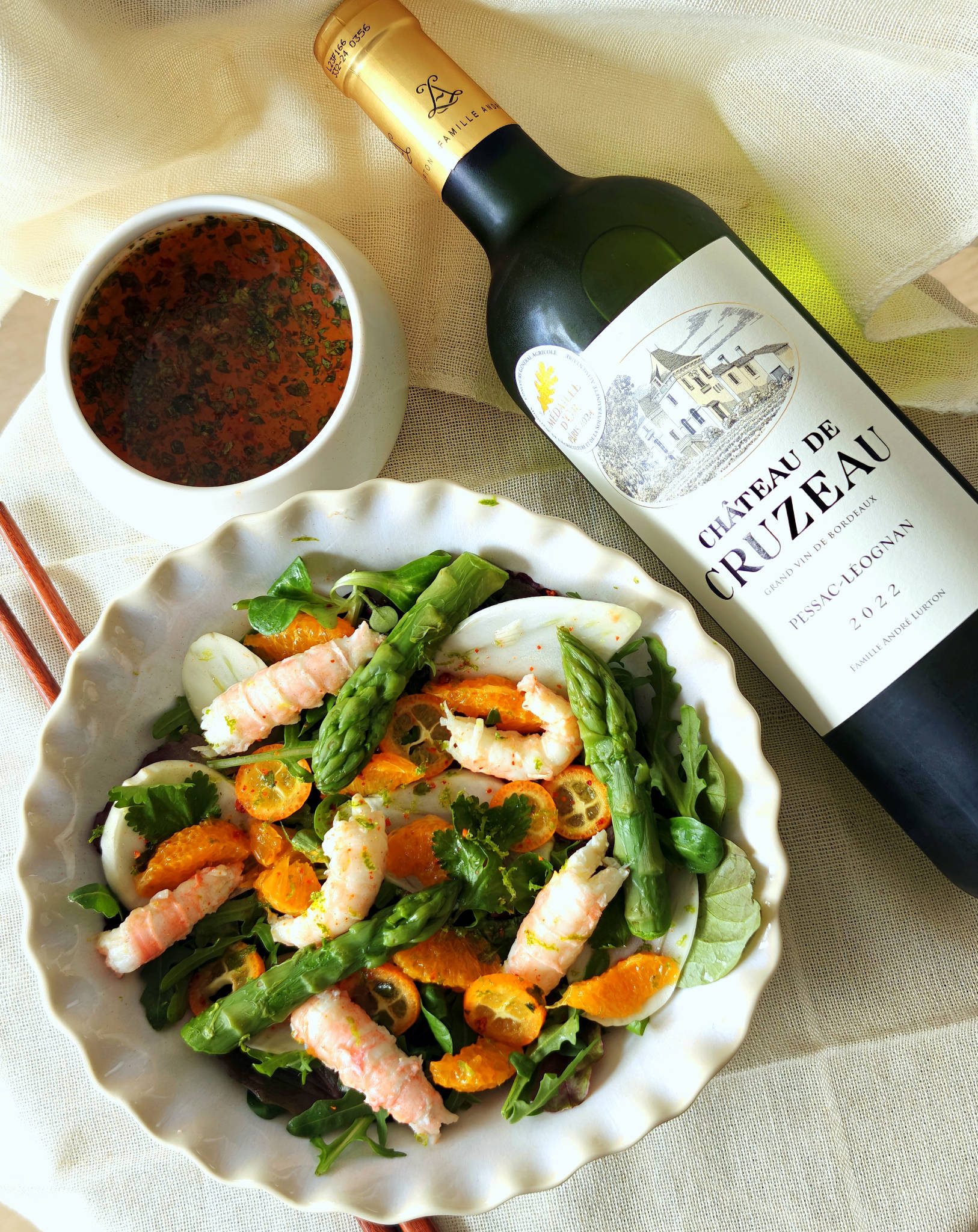 Salade fraîche de langoustines aux agrumes, Château de Cruzeau blanc 2022