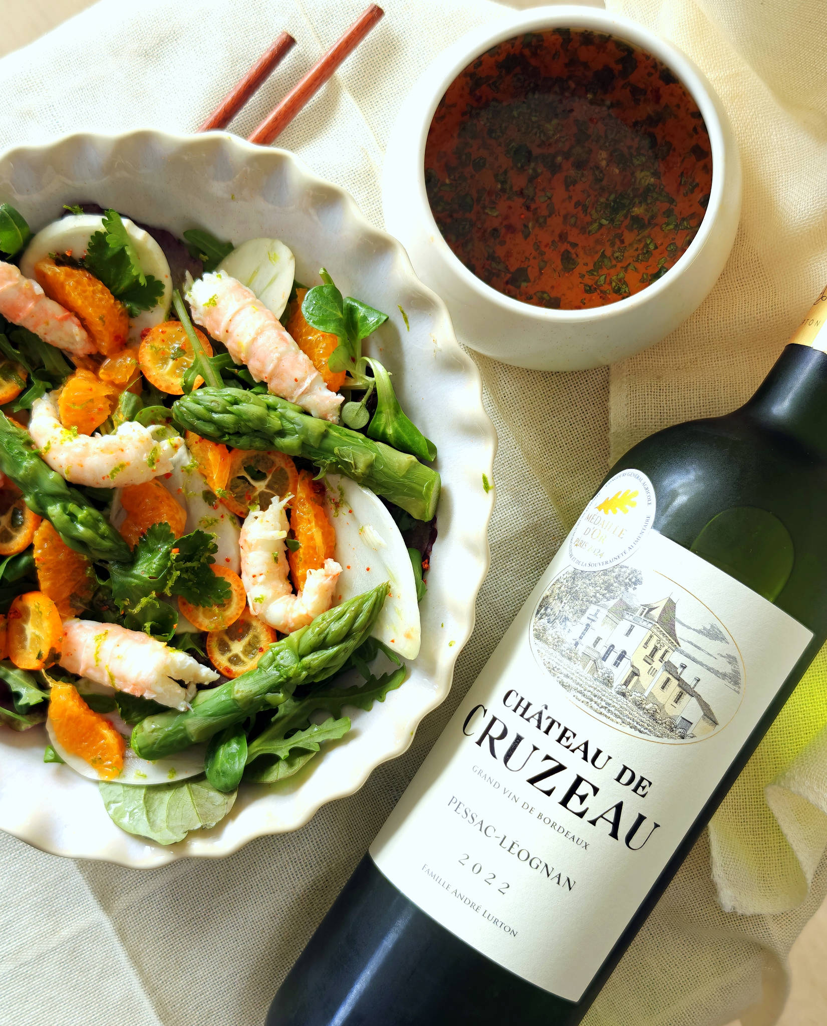 Salade fraîche de langoustines aux agrumes, Château de Cruzeau blanc 2022