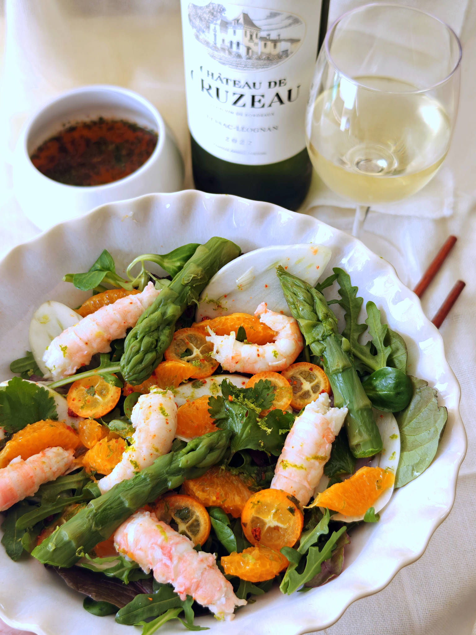 Salade fraîche de langoustines aux agrumes, Château de Cruzeau blanc 2022